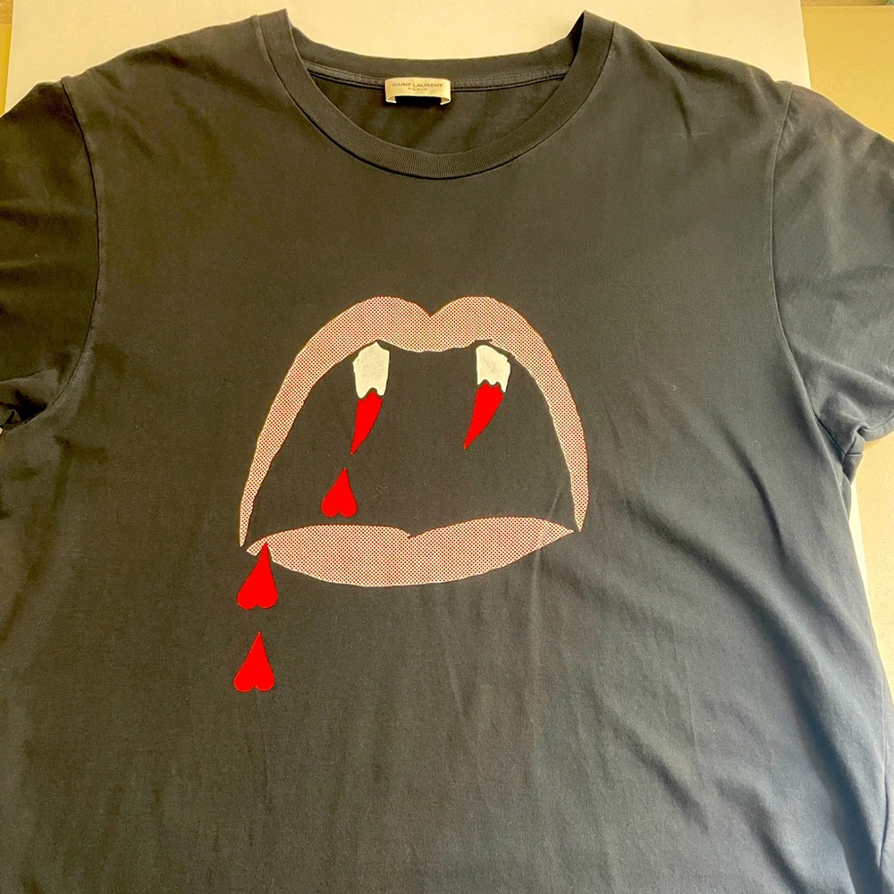 Saint Laurent Classic “Vampire” in black. Excellent condition never worn